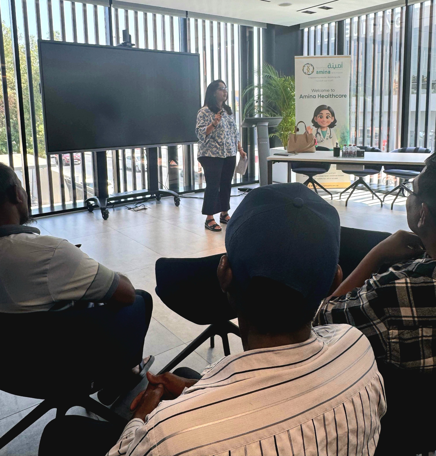 Dr. Priyancka Pansare delivering a wellbeing session at Amina Healthcare, UAE